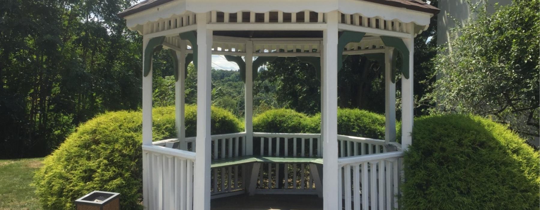 a gazebo in a yard